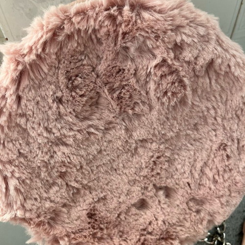Pink round furry bag used with silver chain