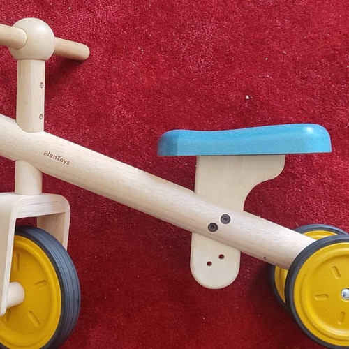 PlanToys toddler balance bike used, solid wood