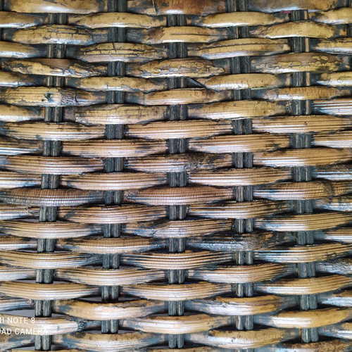 Woven rattan tray used with metal frame