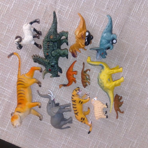 Set of dinosaur and wild animal figures like new