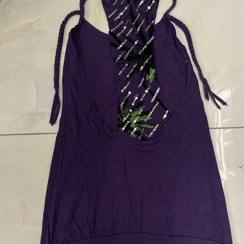 Purple shirt size small with back details like new