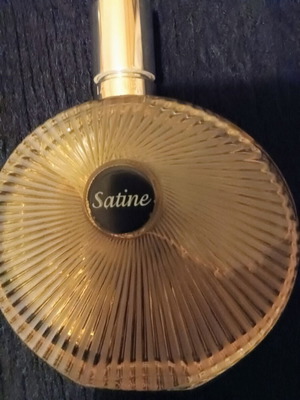 Lalique Satine perfume 100 ml like new with steel jewelry