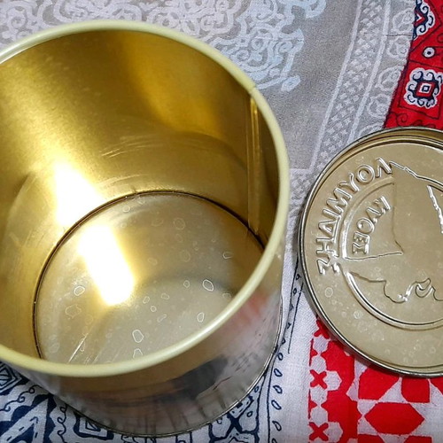 Metal coffee tin Loumidis used