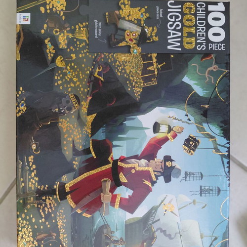 Puzzle 100 pieces with pirates and gold details like new