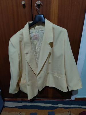 Light yellow linen jacket used, size large