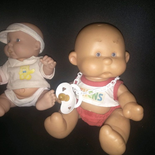 Baby dolls new, set of two mini with clothes and button function