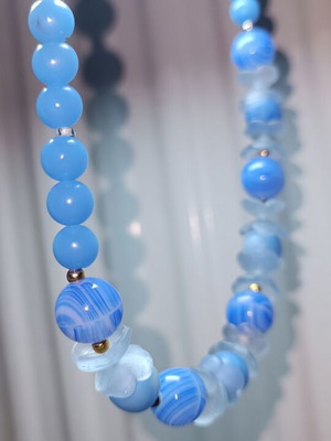 Vintage necklace like new with marble beads and gold steel details