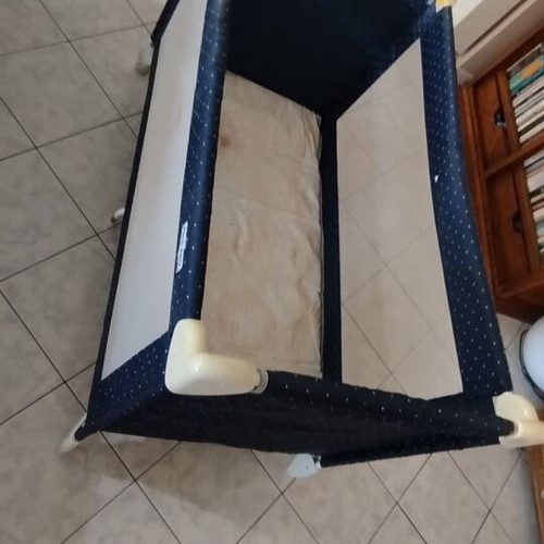 Baby playpen used with handle, dimensions 1.25x0.65x0.84 m