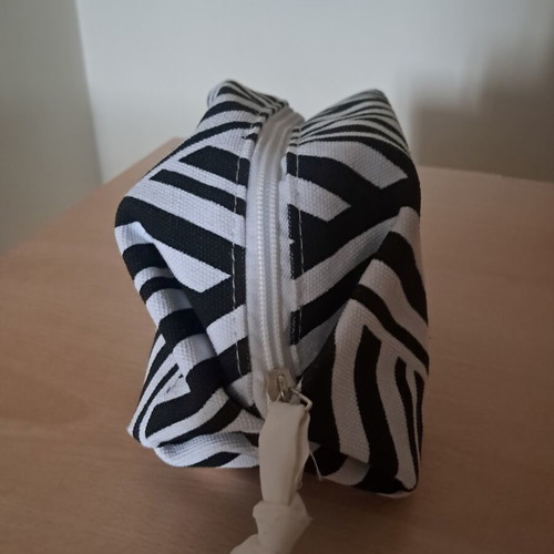 Neutrogena toiletry bag, black and white