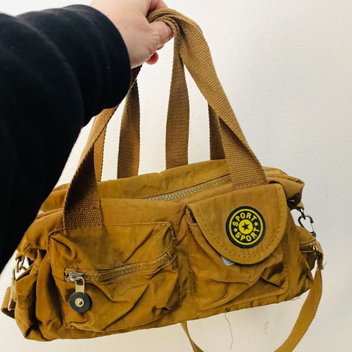 Mini shoulder bag like new, yellow nylon with multiple pockets