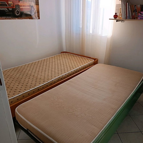 Single bed with used sliding bed and metal frame