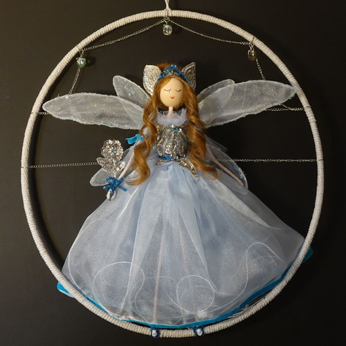 Blue fairy handmade doll in circular frame new