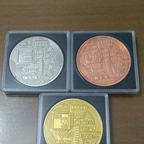 Coins complete uncirculated Bitcoin series in protective capsules, new