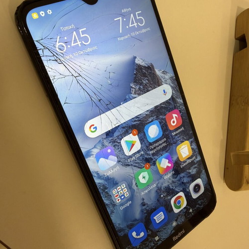 Xiaomi Redmi 8 smartphone used with cracked screen and damages