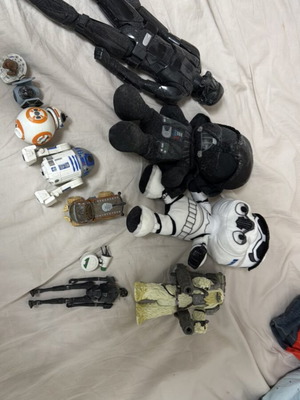 Star Wars figures collection with plush and droid toys