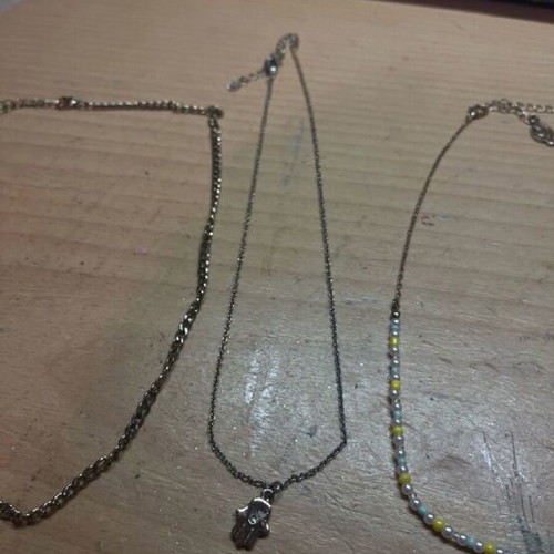 Necklace set of three gold-colored like new with adjustable clasp