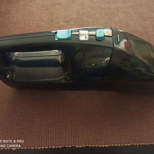 Delonghi handheld vacuum used, blue black, 6V with battery and charger
