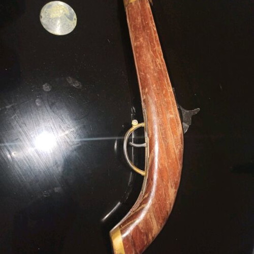 Decorative flintlock pistol used with vintage style