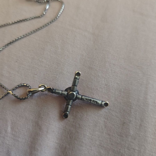 Women's silver cross with gold, like new