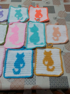 Kitchen potholders new, knitted in various designs