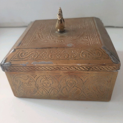 Oriental copper box used with carved decorations