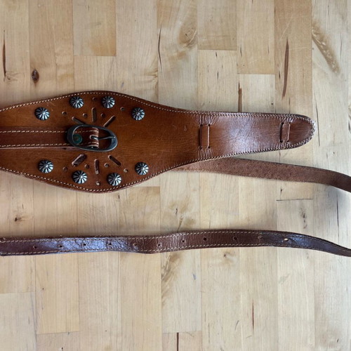 Camel leather belt used with metal details