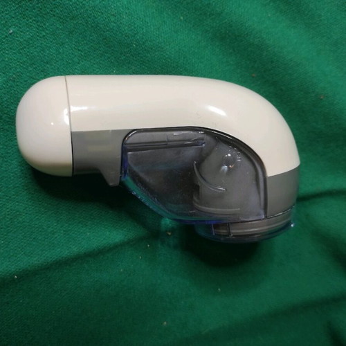 Crown fabric lint remover used, battery operated