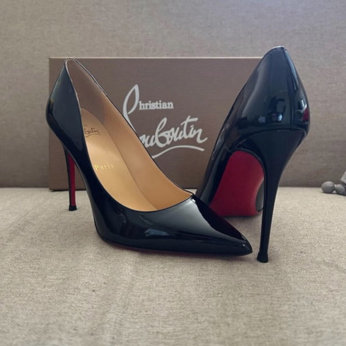 Christian Louboutin black patent leather pumps used
