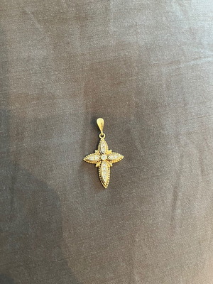 14k cross used with intricate design and zircon