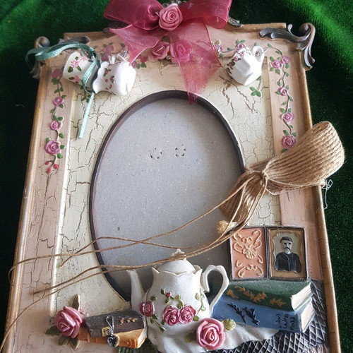 Frame with hanging decorations used, broken support