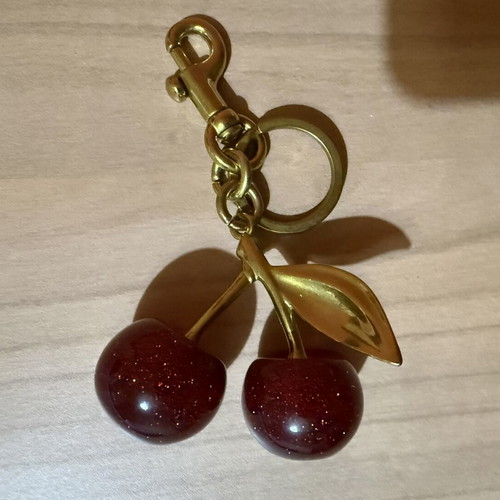 Cherry bag accessory or keychain new, red and gold
