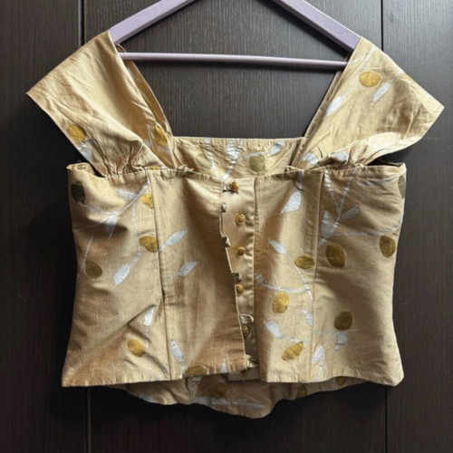 Gold blouse and skirt set with leaf pattern and tulle hem