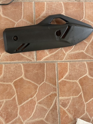 Honda PCX 2023-2025 Exhaust Guard used with visible scratches