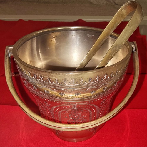 Silver-plated ice bucket like new with carved details and special handle