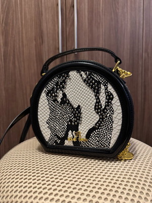 Louie Tinor crossbody bag new