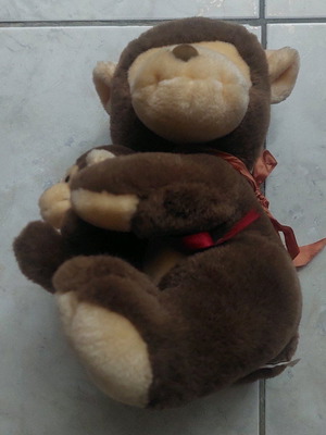 Plush monkey with her baby