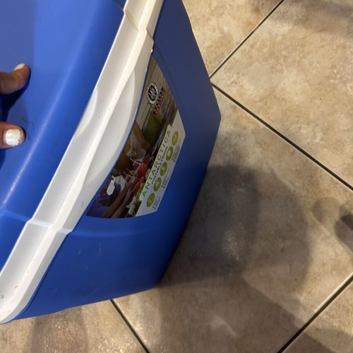 Portable sea cooler like new, blue plastic with handle lock