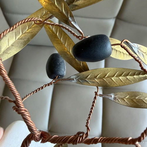 Handmade olive decoration on marble base used