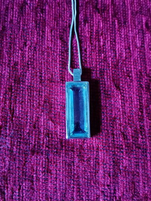 Pendant with blue Swarovski crystal used, stainless steel