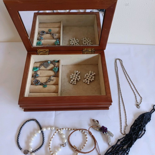 Vintage wooden jewelry box with jewelry used