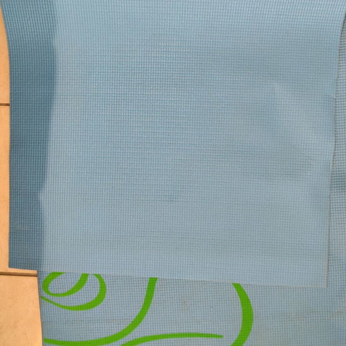 Exercise mat used with visible signs of wear