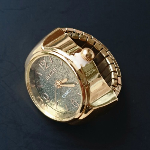 Ring watch quartz with khaki dial and gold bracelet like new