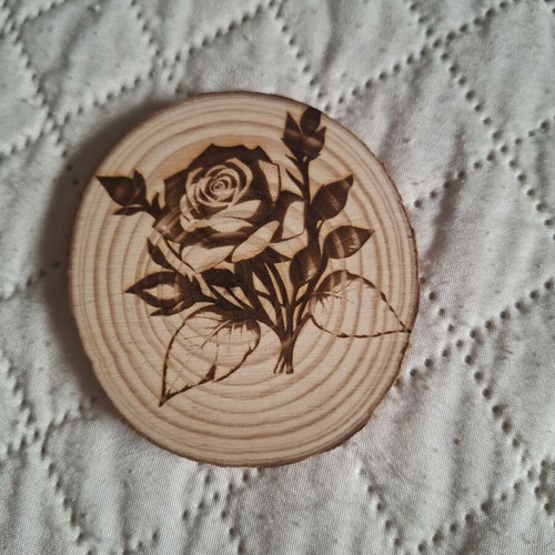 Wooden decorative piece with laser design