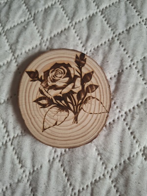 Wooden decorative piece with laser design