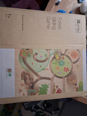 Wooden toy like new that develops fine motor skills