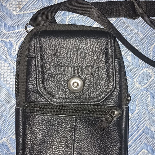 Konoitian crossbody bag like new, black leather texture