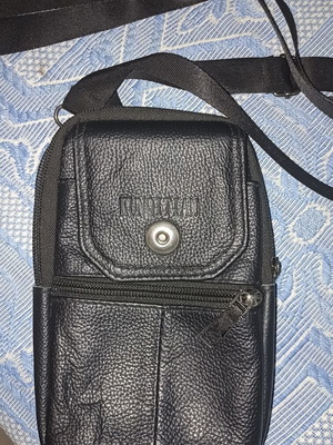 Konoitian crossbody bag like new, black leather texture
