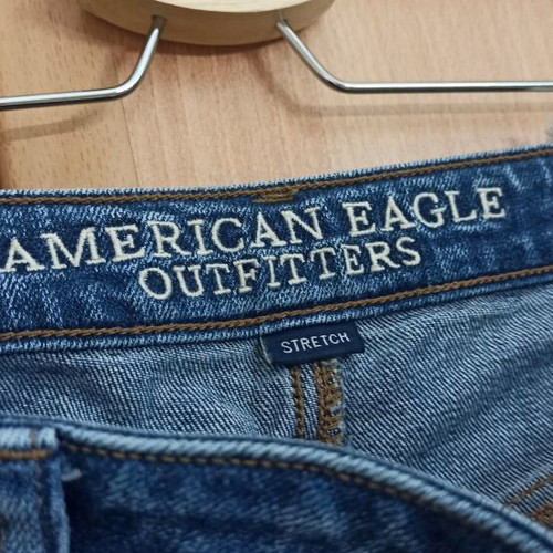 American Eagle vintage crop jeans used with knee rip