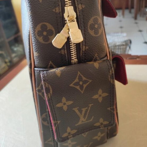 Louis Vuitton Monogram Excentri Cite handbag hand brown like new