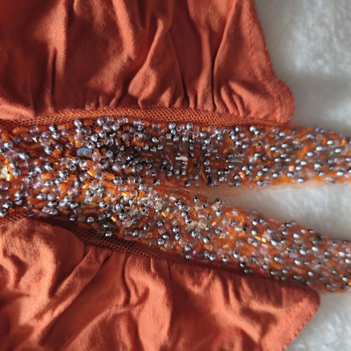Orange blouse with embroidered beads, like new